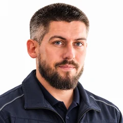 Adam Kurnatowski w kurtce roboczej